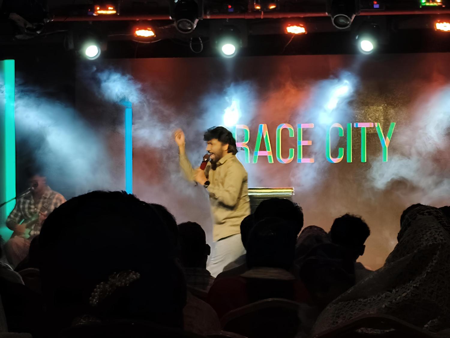 Pastor Teshy Frashans worshipping at Grace City